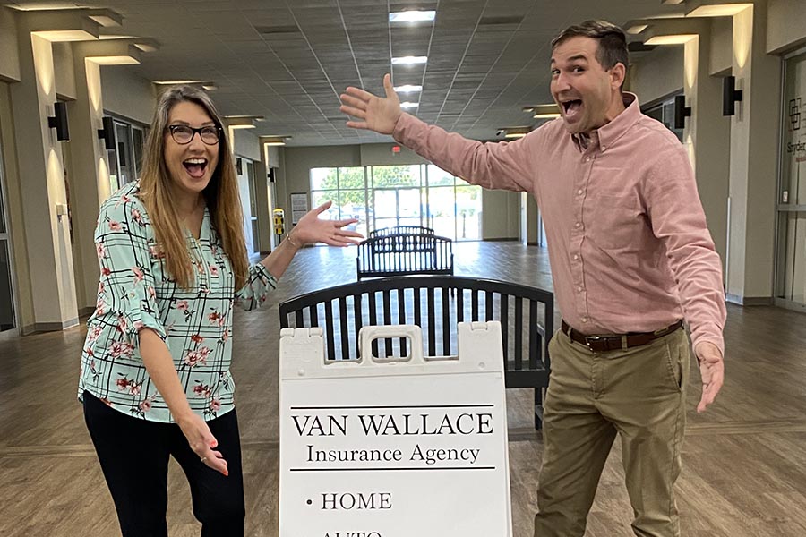 About Our Agency - Van Wallace Agency Team at Their Office, Greeting Visitors and Having Fun